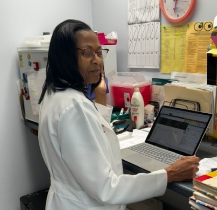 Medical director providing occupational health consultation